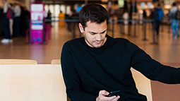 man waiting for flight