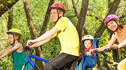 family biking together