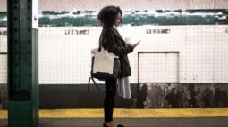 woman waiting for subway