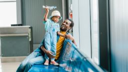 father and son at airport