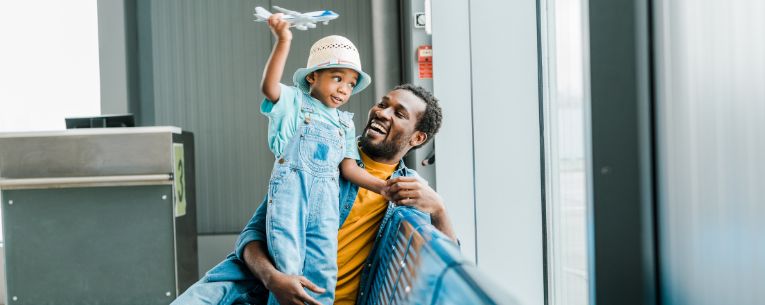 Allianz - father and son at airport