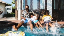 family at the pool at a resort